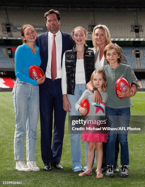 Gillon McLachlan, Chief Executive Officer of the AFL poses for a photograph with children Sydney, Edie, Cleo, Luna and wife Laura speaks to media...