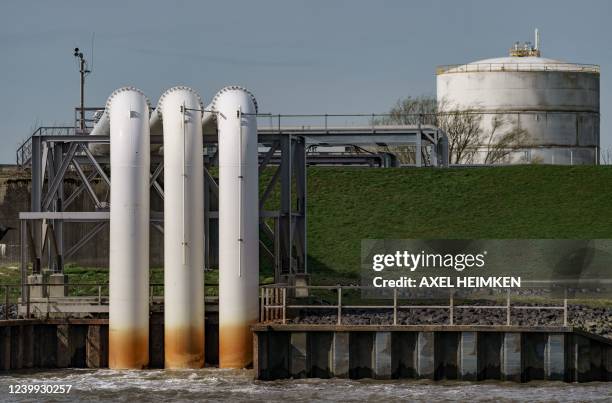 Port facilities of the DOW Chemical Company, a global leader in the chemical business, are pictured at the industrial harbour of Stade, on the river...