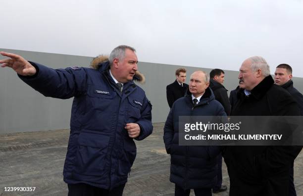 Roscosmos chief Dmitry Rogozin speaks with Russian President Vladimir Putin and Belarus President Alexander Lukashenko during their visit at the...