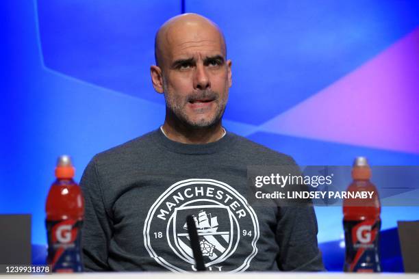 Manchester City's Spanish manager Pep Guardiola attends a press conference at the Manchester City training ground in Manchester, north west England,...