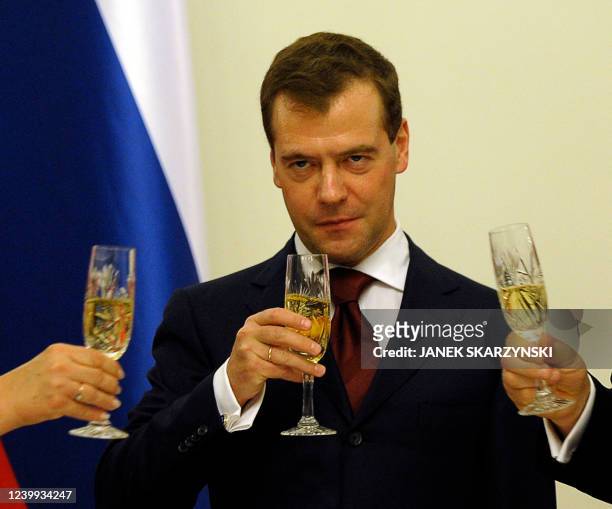 Russian President Dmitry Medvedev raises a toast during during an official dinner with Polish President Bronislaw Komorowski on December 6, 2010 at...