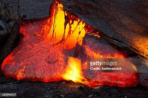 lava emerging - volcanic landscape stock pictures, royalty-free photos & images