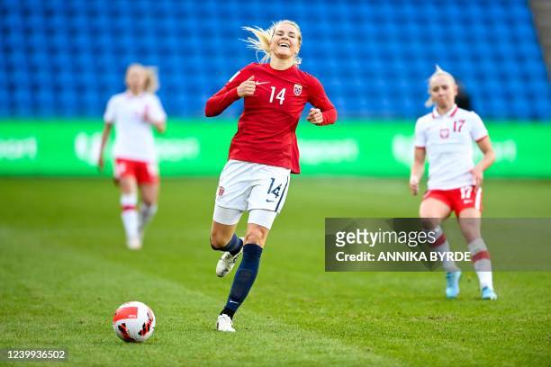 Norway's forward Ada Hegerberg runs with the ball during the Women's FIFA World Cup 2023 qualification football match Norway v Poland in Oslo, on...