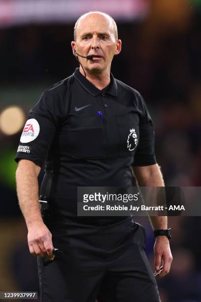 Referee Mike Dean during the Premier League match between Burnley and Everton at Turf Moor on April 6, 2022 in Burnley, England.