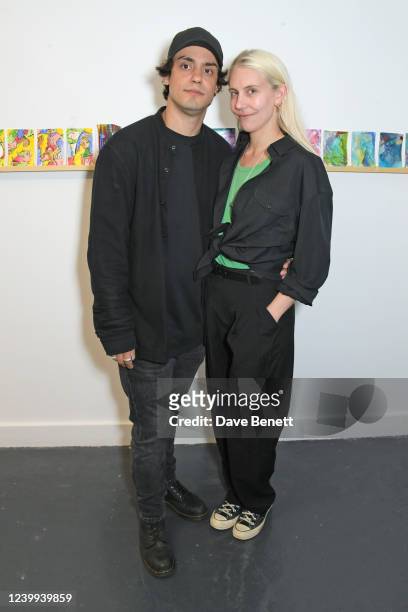 Beto Distassi and India Rose James attend a private view of the Art On A Postcard mini-auction curated by India Rose James in aid of Choose Love's...