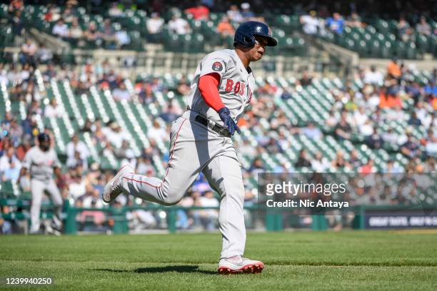 Rafael Devers of the Boston Red Sox runs after hitting a single during the top of the eighth inning against the Detroit Tigers at Comerica Park on...