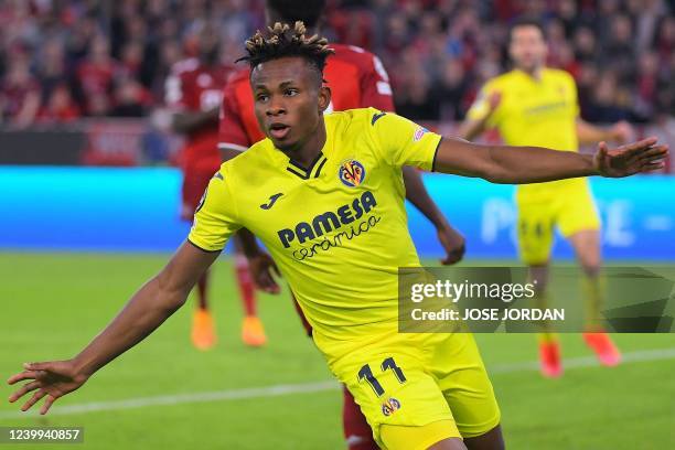 Villarreal's Nigerian midfielder Samuel Chukwueze celebrates scoring the 1-1 during the UEFA Champions League quarter-final, second leg football...