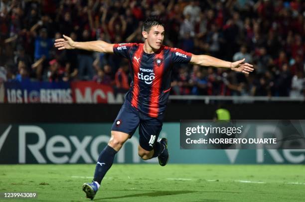 Paraguay's Cerro Porteño Fernando Romero celebrates after scoring against Argentina's Colon de Santa Fe during the Copa Libertadores group stage...