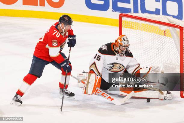 Goaltender John Gibson of the Anaheim Ducks stops a shot by Patric Hornqvist of the Florida Panthers in the second period at FLA Live Arena on April...