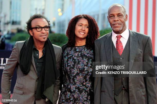 Actor Danny Glover , his wife Asake Bomani and French musician Manu Katché hit the red carpet before a homage ceremony during the 37th US Film...