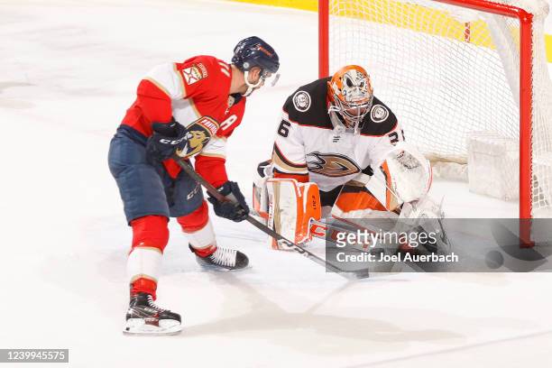 Jonathan Huberdeau of the Florida Panthers scores the game-winning goal in overtime against goaltender John Gibson of the Anaheim Ducks at the FLA...