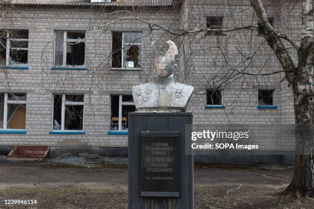 Damaged monument to the hero of the Soviet Union Petrichenko Andrey Arkhivovich. Chaos and devastation on the streets of Andriivka as a result of the...