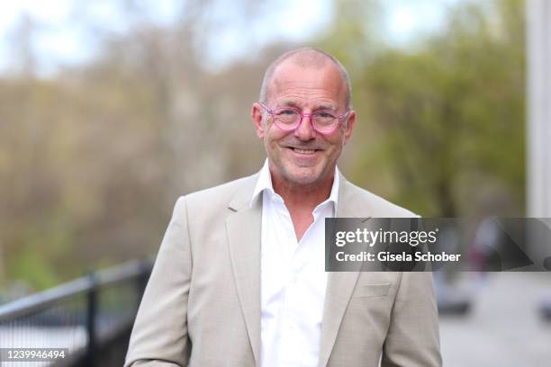 Heino Ferch, with pink glasses, attends the world premiere of the new coffee machine WMF Perfection at Haus der Kunst on April 12, 2022 in Munich,...