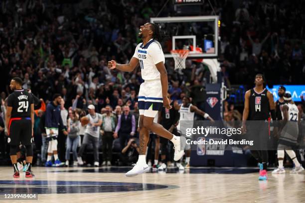 Naz Reid of the Minnesota Timberwolves celebrates a dunk by Anthony Edwards against the Los Angeles Clippers in the fourth quarter during a Play-In...