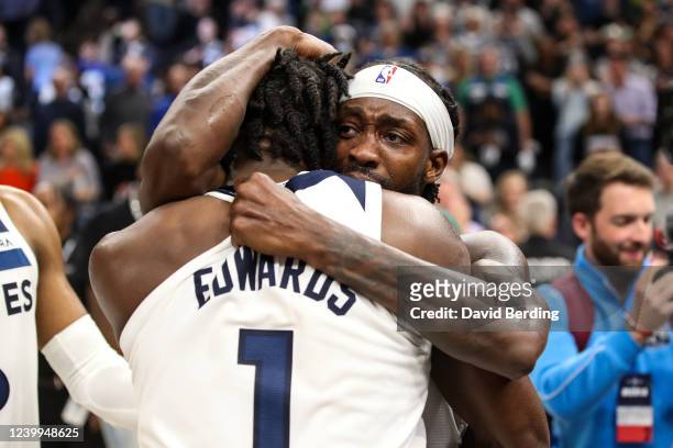 Patrick Beverley and Anthony Edwards of the Minnesota Timberwolves celebrate a 109-104 victory against the Los Angeles Clippers to advance to the NBA...