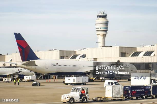 Delta airlines airplanes are seen parked at Hartsfield-Jackson International Airport in Atlanta.