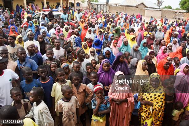 Internally displaced women and children gather at an IDP camp in the Garga Village in the Kanam Local Government Area of the Plateau state on April...