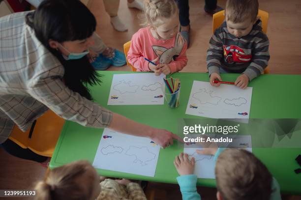 Ukrainian children colouring Slovak and Ukrainian maps as a show of appreciation towards the Slovak nation and their culture in a newly opened...