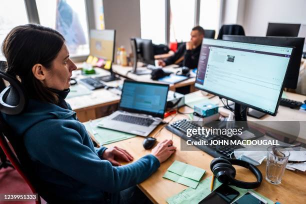 Senior editor of Katapult Ukraine Roksana Panashchuk, who fled Odessa recently, works at her desk, at the publication's headquarters in Greifswald on...