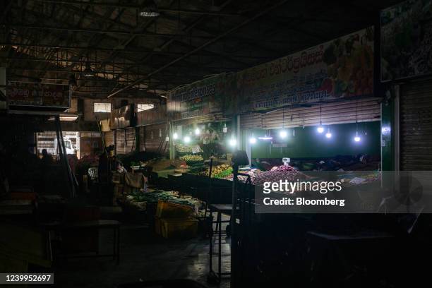 Kirimandala Market during a power cut in Colombo, Sri Lanka, on Tuesday, April 12, 2022. Sri Lanka warned of an unprecedented default and halted...