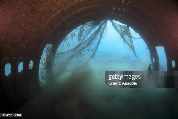 An inside view of the submerged Airbus A300 cargo plane in Kusadasi district of Aydin, Turkiye on April 13, 2022. Ghost nets covered the Airbus A300...
