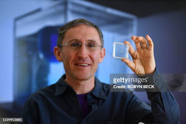 Bionaut Labs CEO and founder Michael Shpigelmacher displays the tiny remote-controlled medical micro-robot called Bionaut which his company is...