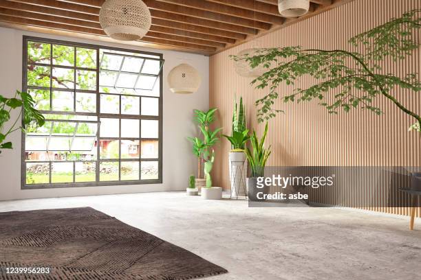 camera da letto accogliente non arredata con parete e finestra in legno - stile minimalista foto e immagini stock