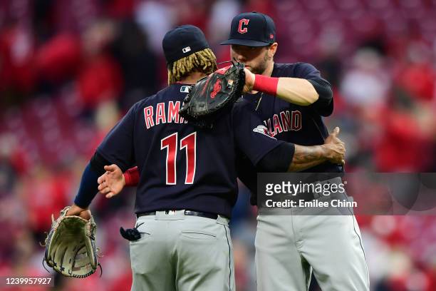 José Ramírez Owen Miller of the Cleveland Guardians celebrate after the Guardians win the game 10-5 over the Reds during the game between the...