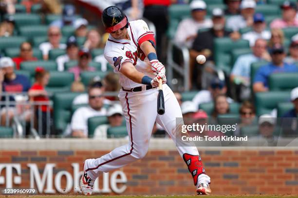 Austin Riley of the Atlanta Braves hits a home run during the sixth inning of an MLB game against the Washington Nationals at Truist Park on April...