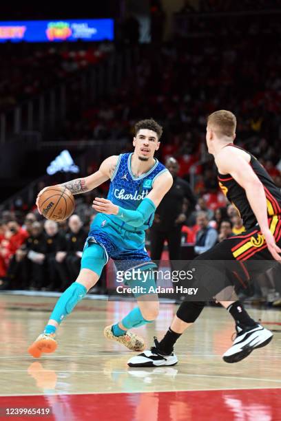 LaMelo Ball of the Charlotte Hornets dribbles the ball during the game against the Atlanta Hawks during the 2022 Play-In Tournament on April 13, 2022...