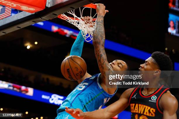 Washington of the Charlotte Hornets dunks during the first half against the Atlanta Hawks at State Farm Arena on April 13, 2022 in Atlanta, Georgia....