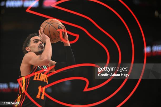 Trae Young of the Atlanta Hawks shoots a free throw against the Charlotte Hornets during the 2022 Play-In Tournament on April 13, 2022 at State Farm...