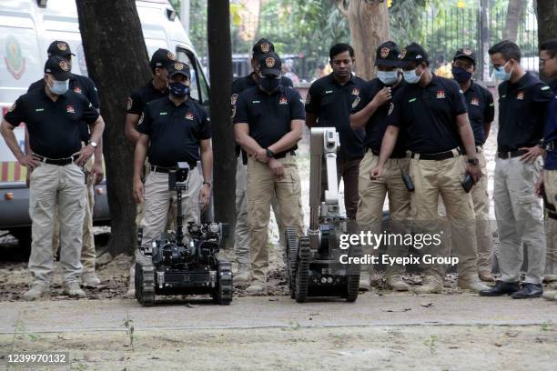 Dhaka Metropolitan Police during a military demo with robot to detect explosives as part of the New Year security arrangements at Ramna Batamul, On...