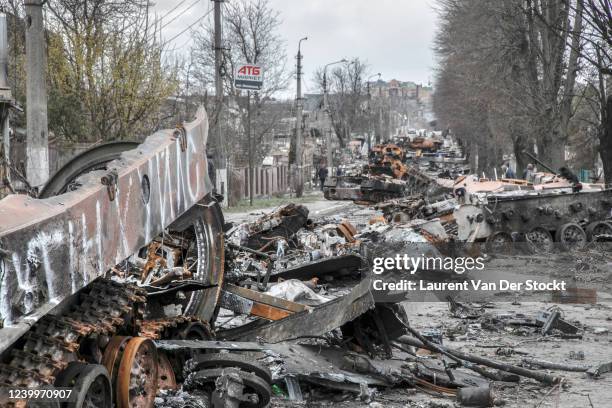 Column of destroyed Russian tanks on Vokzalna Street on April 4, 2022 in Bucha, Ukraine. The Russian retreat from towns near Kyiv has revealed scores...