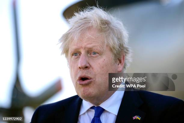 Prime Minister Boris Johnson meets crews and technical staff at Lydd Airport on April 14, 2022 in Dover, England. The UK government announced that...