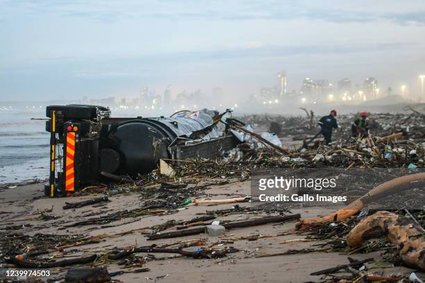 Road Tanker washed up on a Durban beach amid floods and heavy rain on April 12, 2022 in Durban, South Africa. According to media reports, persistent...