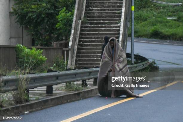 Man walks on the highway on April 12, 2022 in Durban, South Africa. According to media reports, persistent heavy rain in parts of KwaZulu-Natal has...