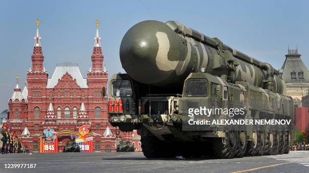 Russian Topol-M intercontinental ballistic misiles drive through Red Square during the Victory Day parade in Moscow on May 9, 2010. Troops from four...