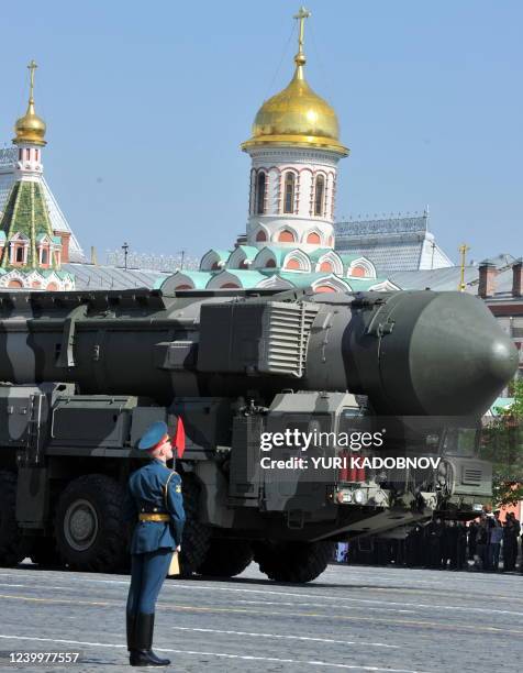 Russian Topol-M intercontinental ballistic misiles drive through Red Square during the Victory Day parade in Moscow on May 9, 2010. Troops from four...