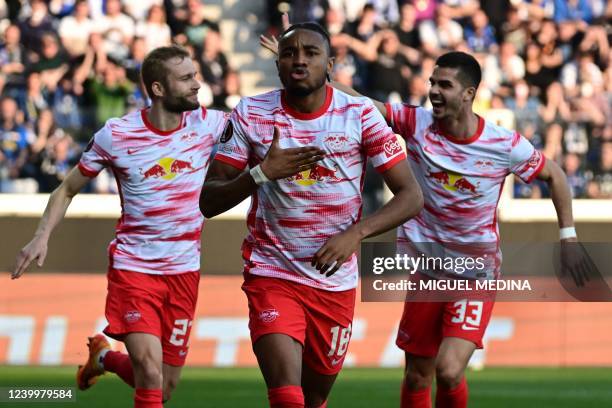 Leipzig's French midfielder Christopher Nkunku celebrates after opening the scoring during the UEFA Europa League quarter-final, second-leg football...