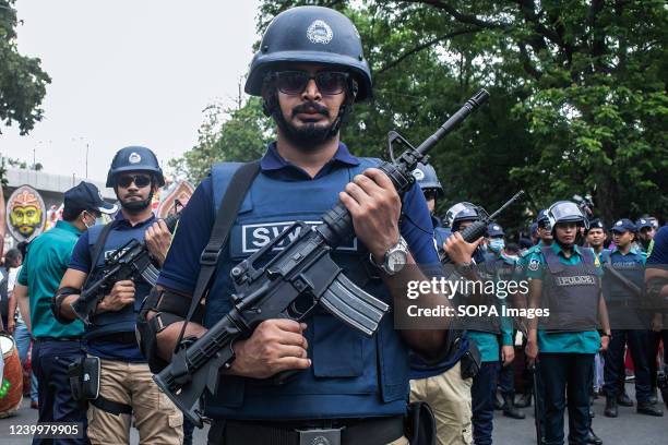 Members of the Special Security Force "SWAT " are deployed in front of the Bengali New Year rally, in Dhaka. Thousands of Bangladeshi people...