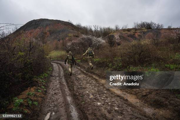 Ukrainian servicemen are seen along the frontline in Donbas, Ukraine on April 14, 2022.