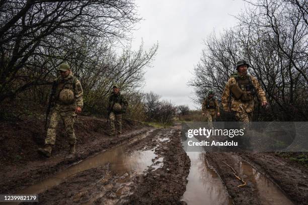 Ukrainian servicemen are seen along the frontline in Donbas, Ukraine on April 14, 2022.