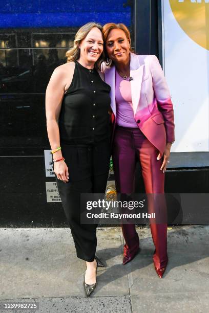 Amber Laign and Robin Roberts celebrate Robin Roberts' 20th "GMA" anniversary outside "Good Morning America" on April 14, 2022 in New York City.