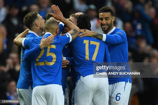 Rangers players celebrate their opening goal during the UEFA Europa League Quarter-final, second leg football match between Rangers and Sporting...