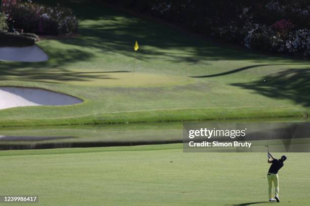 Rear view of Justin Thomas in action during Sunday play at Augusta National. Augusta, GA 4/10/2022 CREDIT: Simon Bruty