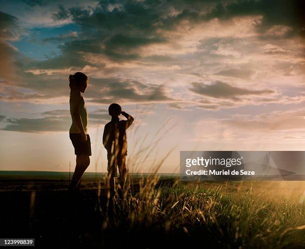 children i evening light - anticipation stock pictures, royalty-free photos & images
