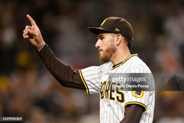 Joe Musgrove of the San Diego Padres points into the crowd as he leaves the game during the seventh inning of a baseball game against the Atlanta...