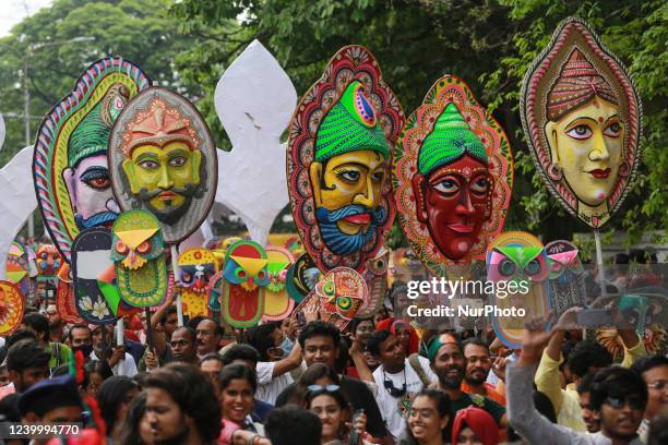 People participate in a rally to celebrate the Bengali New Year or Pohela Boishakh in Dhaka, Bangladesh on April 14, 2022.