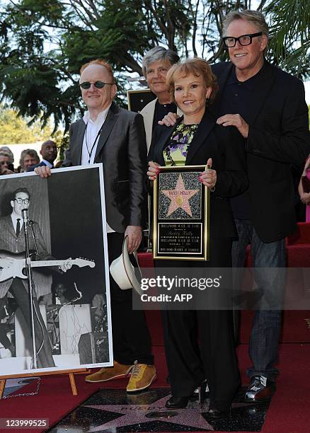 Peter Asher, Phil Everly, Maria Elena Holly and Gary Busey attend the Buddy Holly Hollywood Walk Of Fame Induction Ceremony in Hollywood, California...